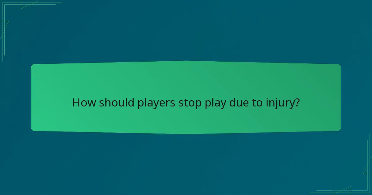 How should players stop play due to injury?
